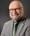 Anton J. Scharl Anton J. Scharl
